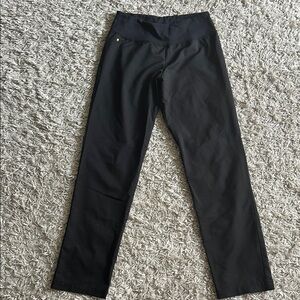 Women’s black scrub pants with gold tooth detail
